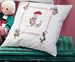 Coussin Bécassine et l'oie  en broderie traditionnelle