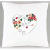 Coussin cœur et arabesques