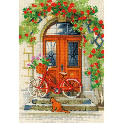 Kit à broder de RIOLIS au point de croix la bicyclette rouge devant la porte fleurie
